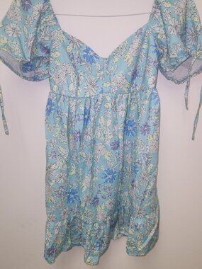 English Factory babydoll dress features a light blue floral print